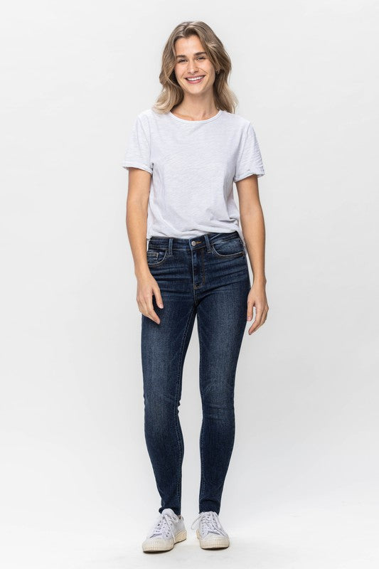 Mid Rise Vintage Raw Hem Skinny Jeans