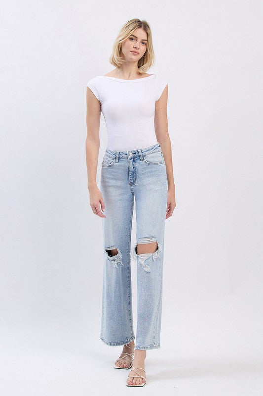 Slick High Rise Distressed Wide Jeans