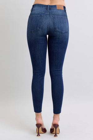 Mid Rise Double Button Raw Hem Skinny Jeans