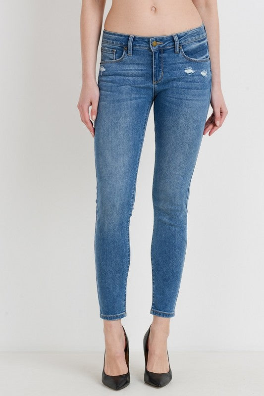 Mid Rise Slightly Distressed Skinny Jeans