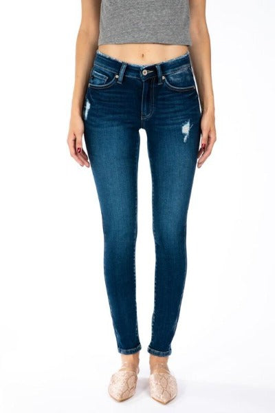 Mid Rise Distressed Super Skinny Jeans